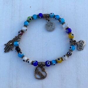 Charm bracelet Evil Eye beads multicolored Charms Hamsa Heart Crown